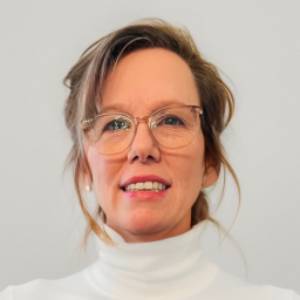 Woman with glasses, light background