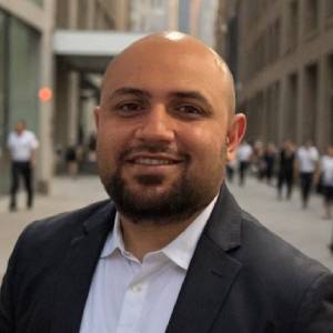 Smiling man in urban setting
